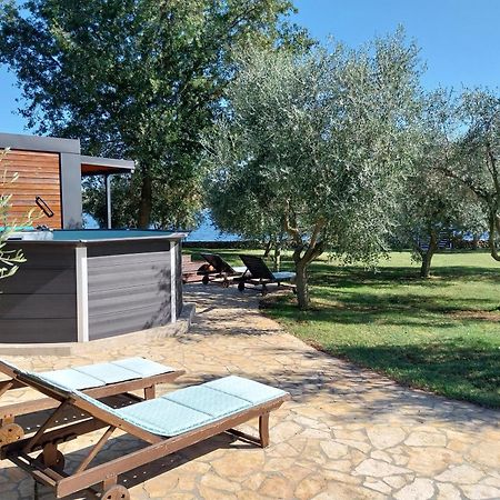 Beach House Ive: Coastal Retreat with Jacuzzi, Pool and Olive Grove Pomer Exterior photo