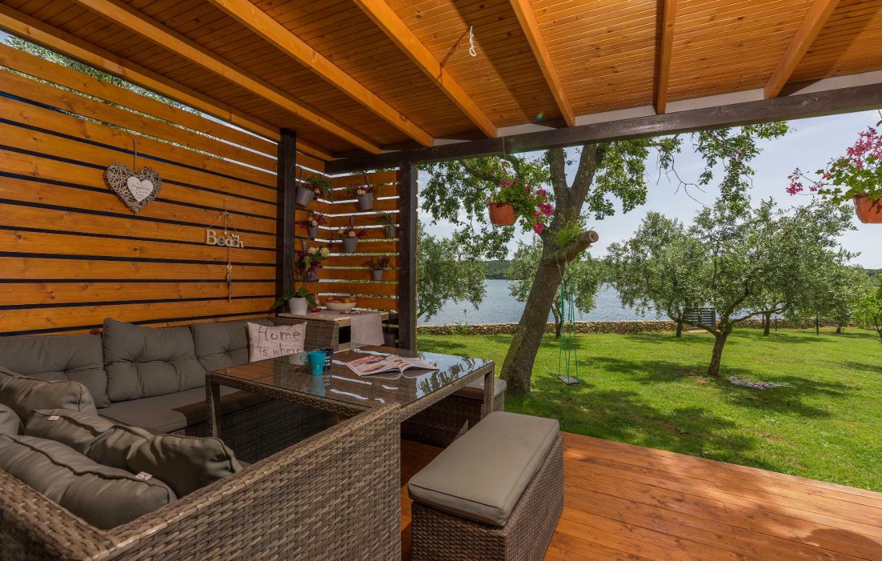 Beach House Ive: Coastal Retreat with Jacuzzi, Pool and Olive Grove Pomer Exterior photo